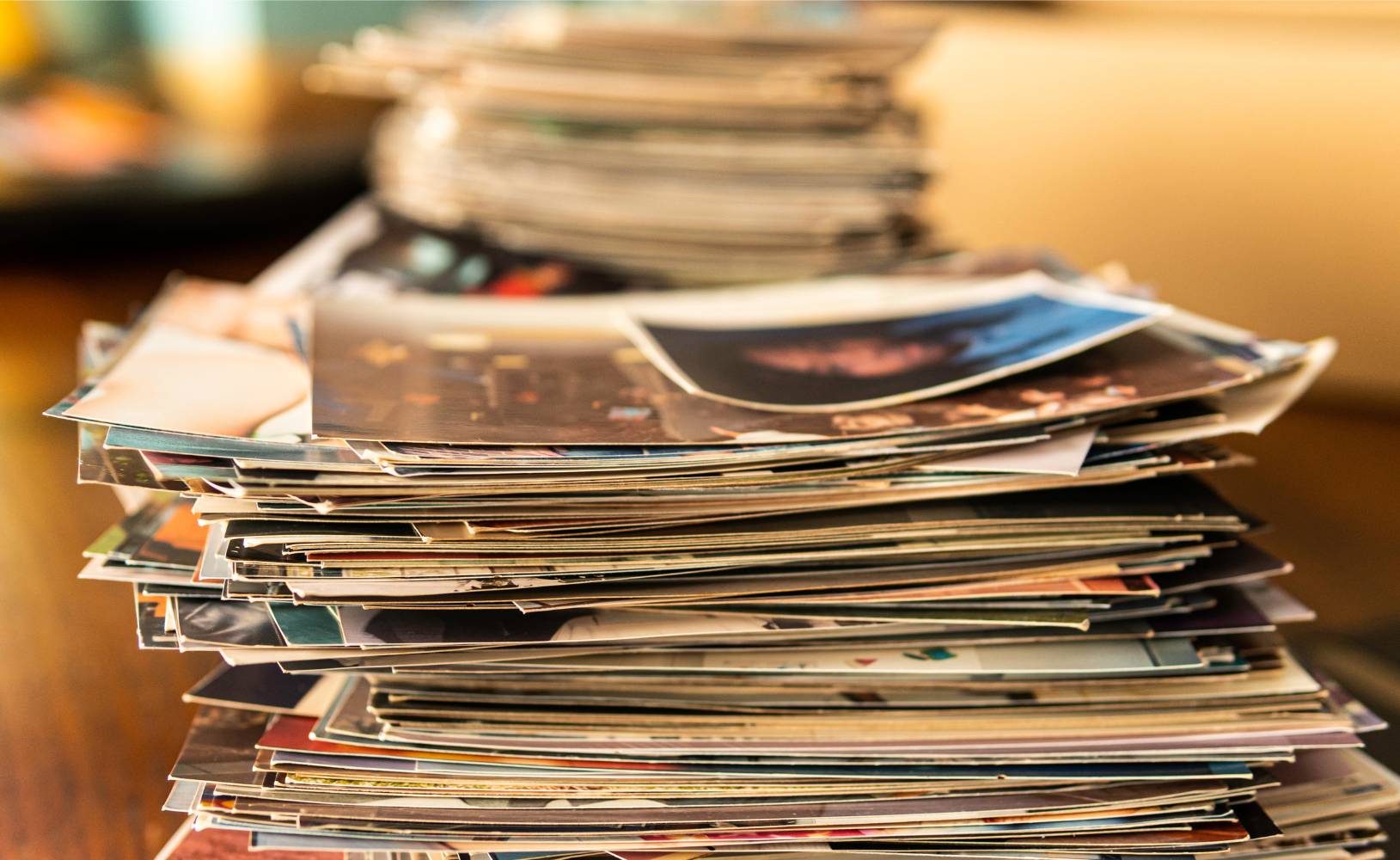 stacks of printed photographs