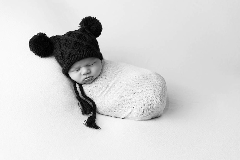 newborn boy in hat